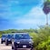 3 Jeeps drive down a street in Costa Maya, Mexico